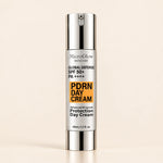 Global Defense PDRN SPF 50+ Day Cream pump bottle on cream background
