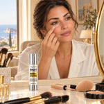 Woman applying makeup after Biolift eye cream to prevent concealer creasing